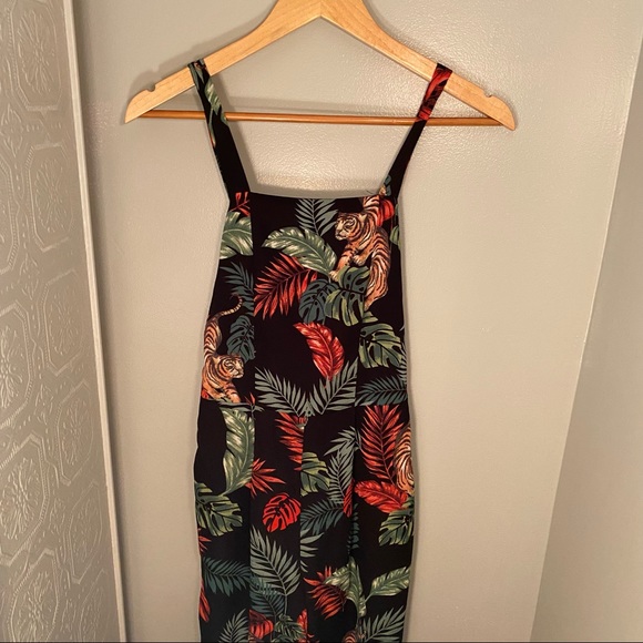 Black fitted romper with floral design, Size XS, wide leg bottoms - Picture 2 of 3